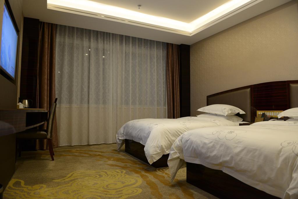 Tie Cheng Hotel Guangzhou Kamer foto